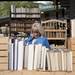 Ann Arbor resident Glenda Bullock looks at books on a shelf at the tenth annual Kerrytown BookFest on Sunday. "We didn't have enough books," Bullock says. Daniel Brenner I AnnArbor.com